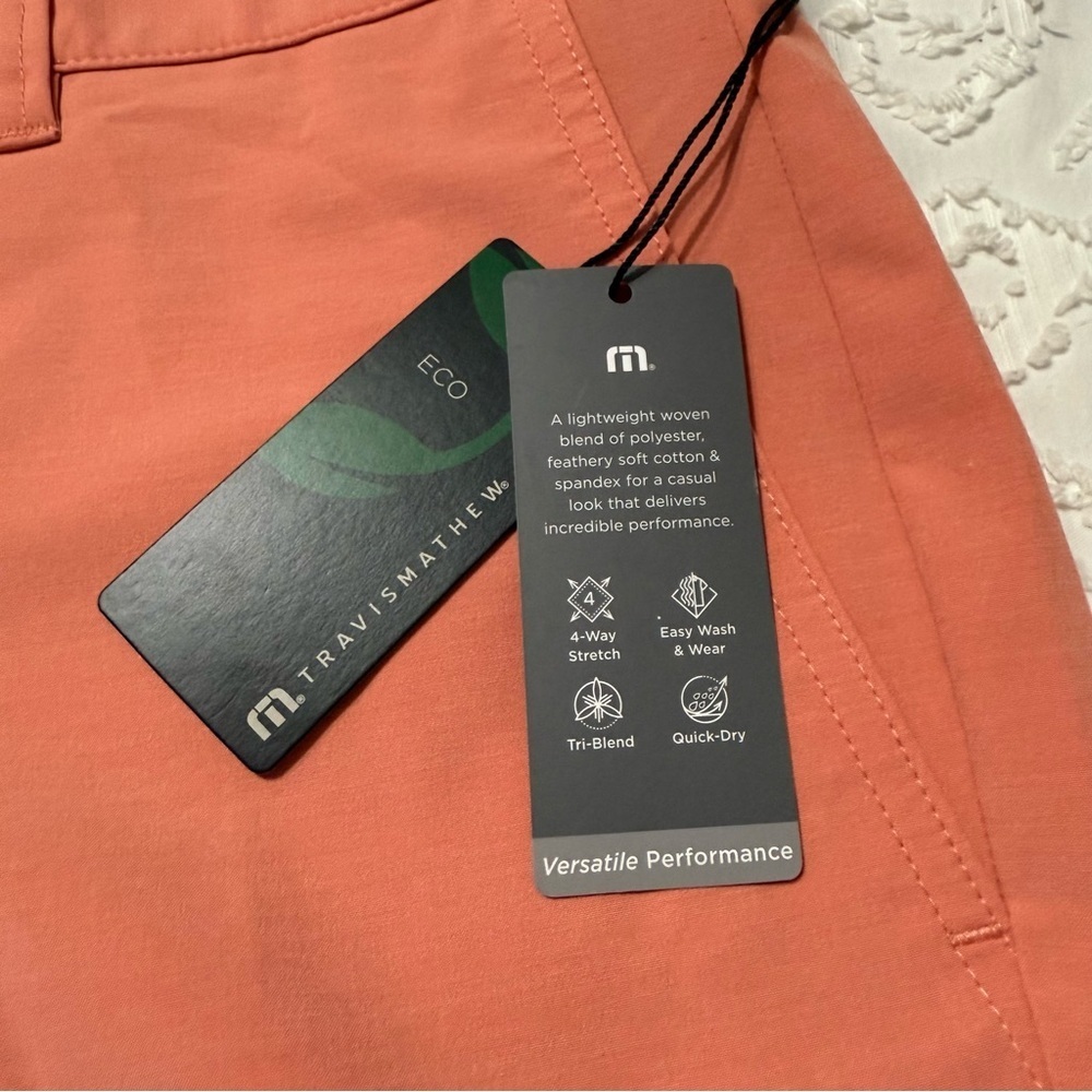 Travis Mathew Tech Chino Shorts Coral 8-Inch Inseam Various Sizes - Picture 9 of 9